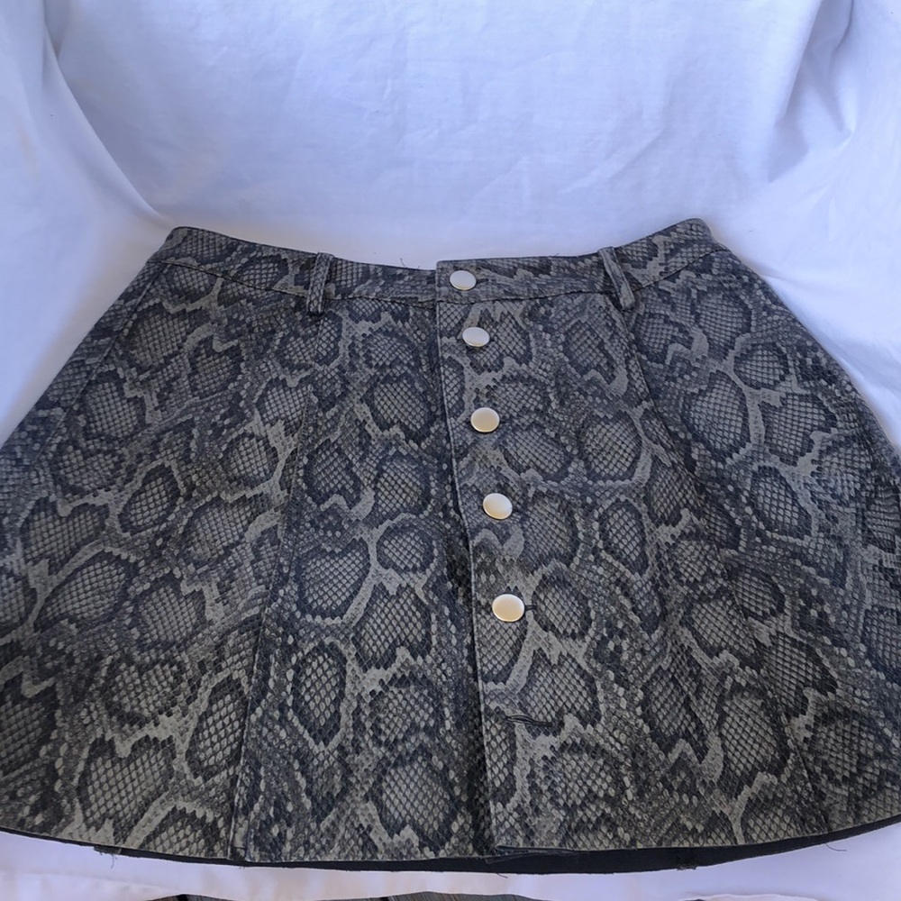 Woman’s Y2k animal print leather mini scuba material skirt